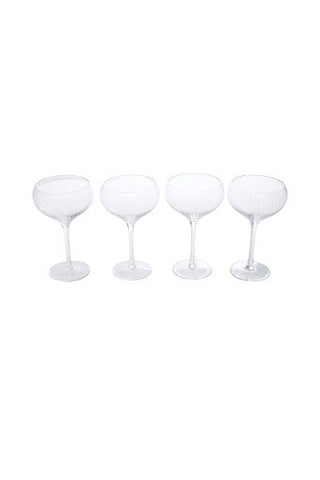 Four clear stemmed cocktail glasses with rounded bowls and flat bases from the lyle set for stylish serving