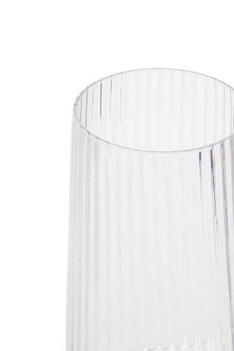 Clear glass vase with vertical ribbed texture featured in the lyle set of four hi ball glasses collection