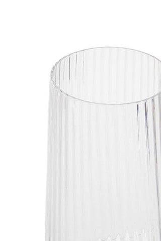 Clear glass vase with vertical ribbed texture featured in the lyle set of four hi ball glasses collection