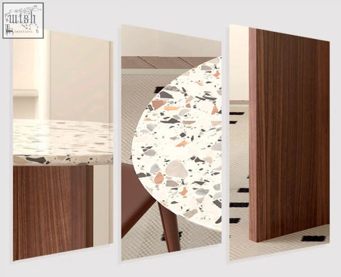 Terrazzo dining table lynette dining table with white base and gray black beige terracotta stone fragments on countertop