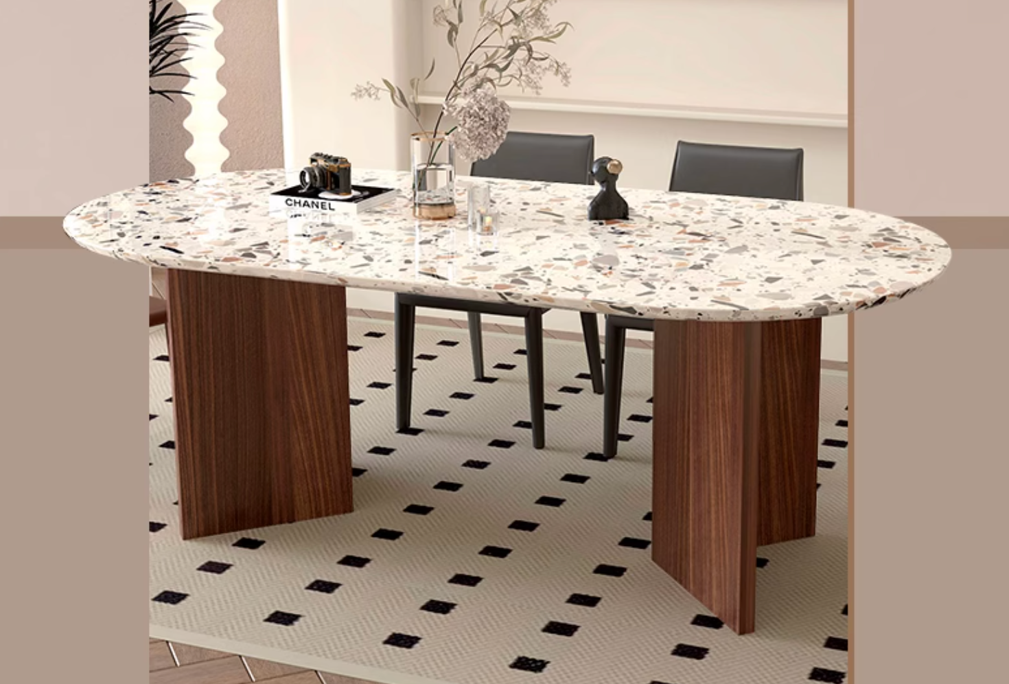 Modern oval dining table lynette with white and black terrazzo top and sturdy dark wood legs for stylish dining spaces
