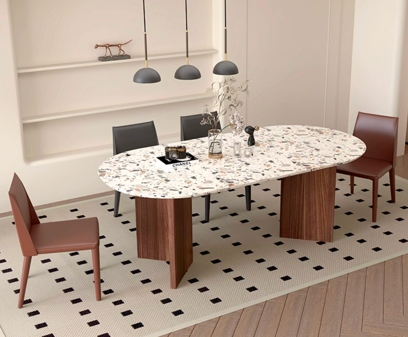 Modern oval dining table with a white and black terrazzo top and sleek wooden legs lynette dining table