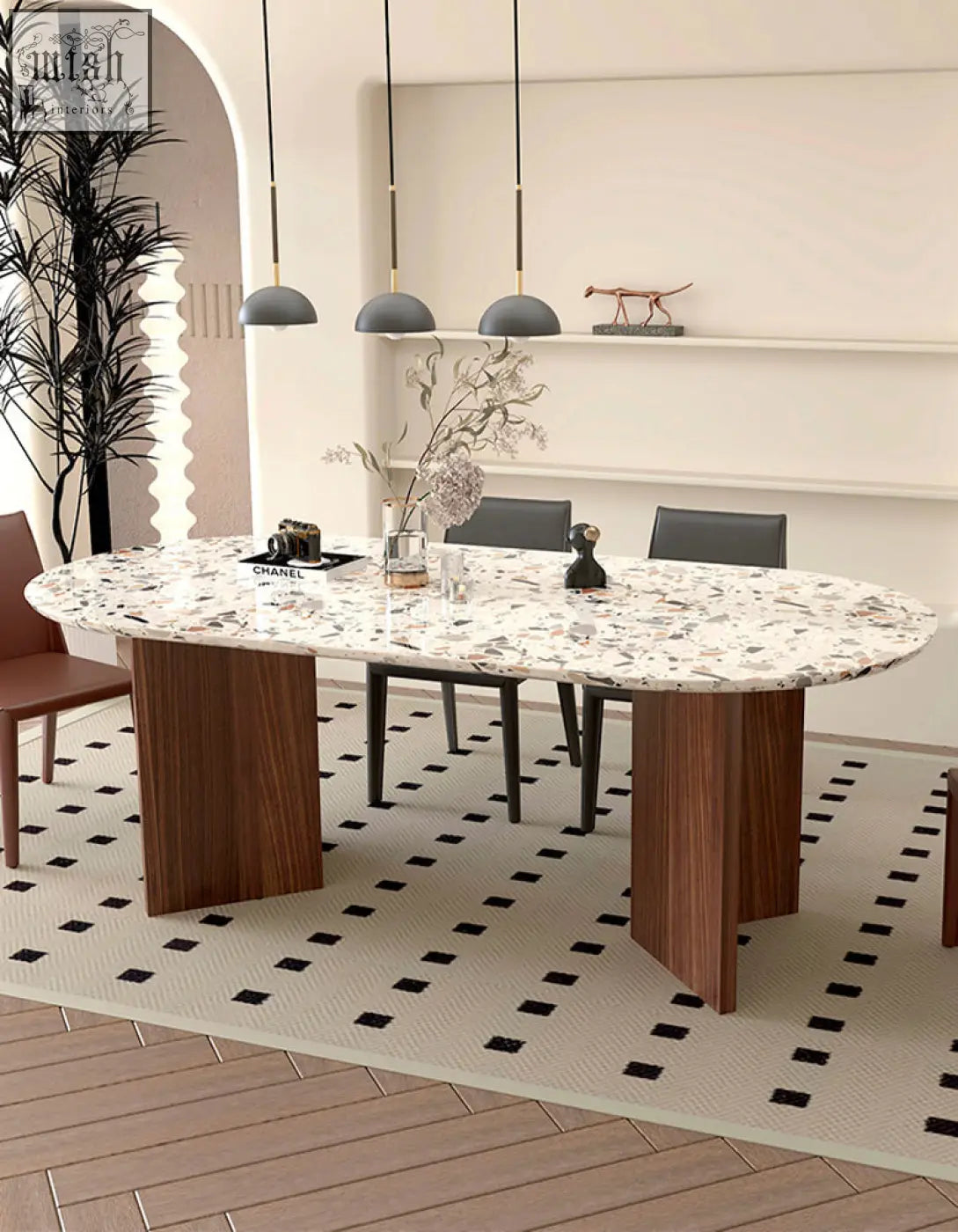 Modern lynette dining table with oval white and gray terrazzo stone top and dark wood legs perfect for dining room