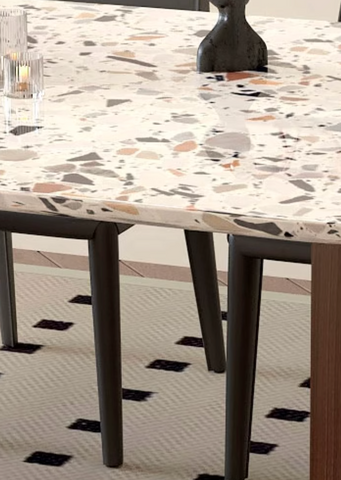 Lynette dining table with terrazzo oval top in white base and speckles of gray beige and muted orange perfect for dining room