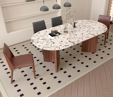 Oval dining table lynette dining table with white terrazzo top featuring gray and black stone patterns and wooden legs