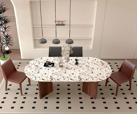 Lynette dining table with white speckled terrazzo oval dining table top and dark wood legs perfect for dining room