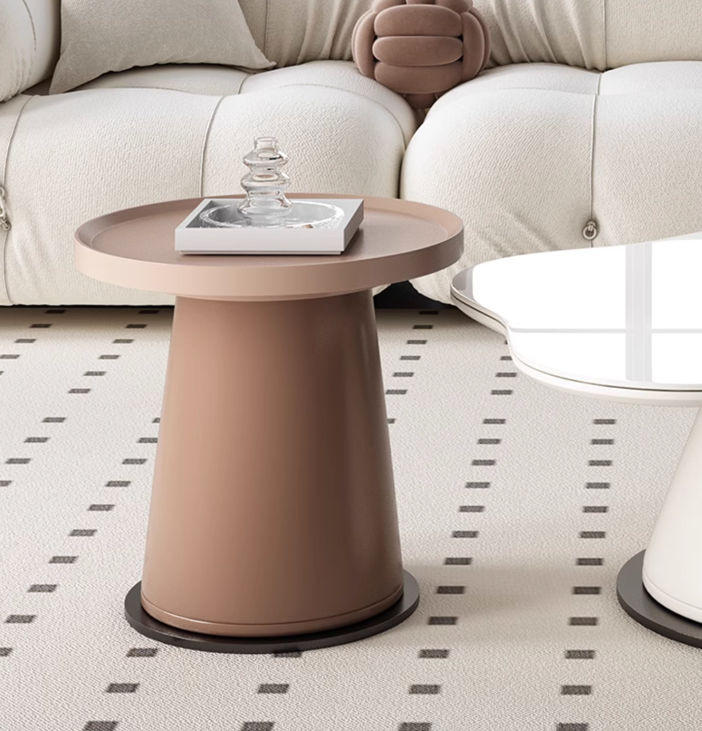 A sleek matte taupe cylindrical side table with flat top and black base from lynn blossoms coffee table set offer financing shipping cost
