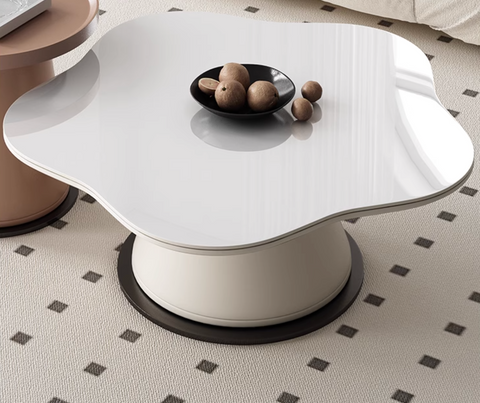 A sleek white cloud shaped coffee table with glossy finish and cylindrical base from lynn blossoms offer financing and shipping cost details available