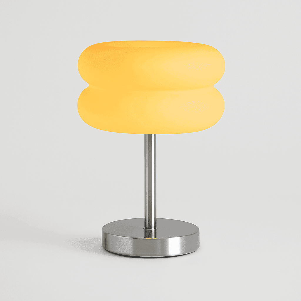 Macaron glass table lamp with a soft yellow frosted glass shade and sleek chrome base perfect for modern decor