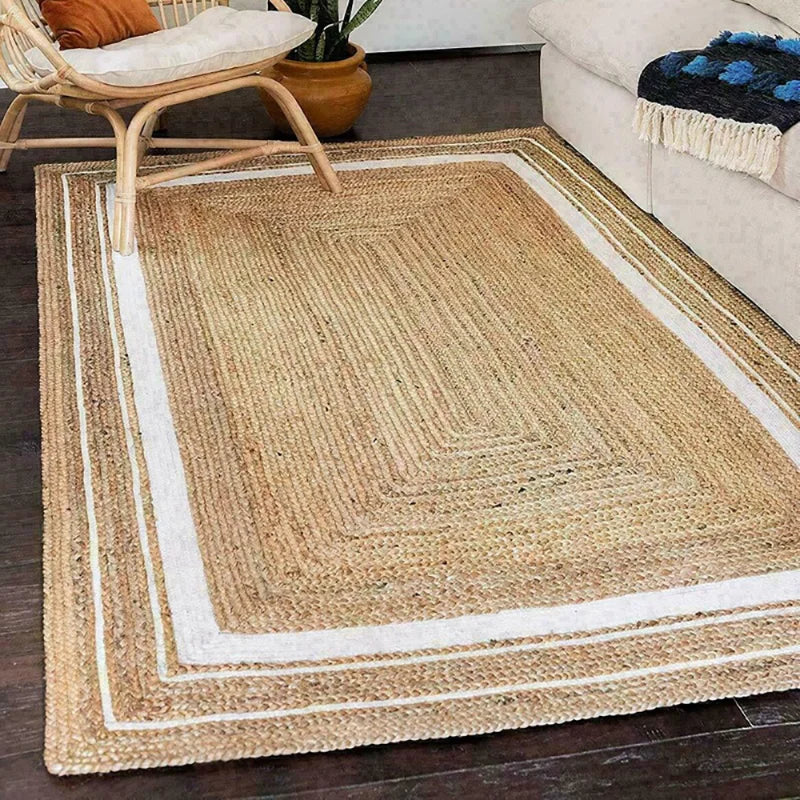 Natural fiber machine rug with woven jute center and white border stripes perfect for any room decor