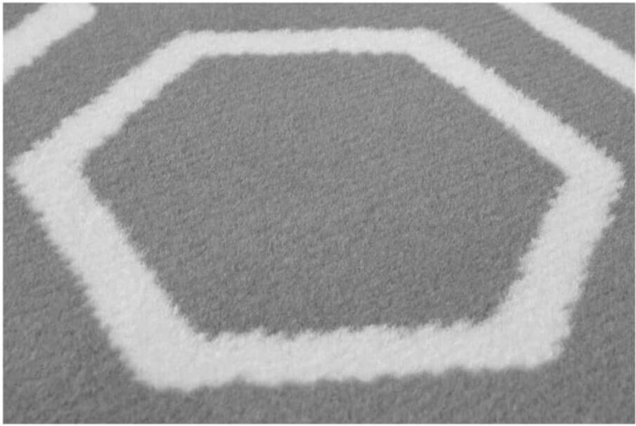 Maestro honeycomb grey rug with white hexagonal pattern on gray carpet perfect for modern home decor