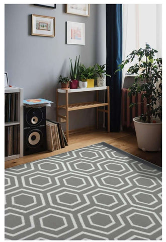 Gray and white geometric patterned maestro honeycomb grey rug with modern hexagonal design for stylish living spaces