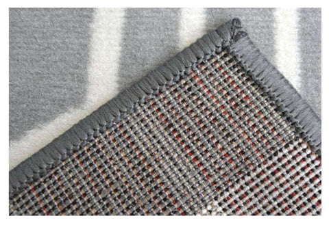 Maestro honeycomb grey rug with woven texture and subtle red accents along the edge for stylish home decor
