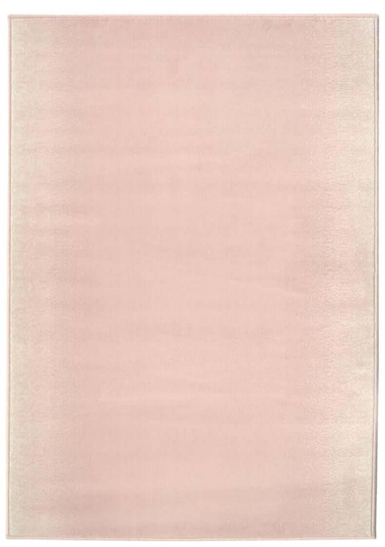 A soft blush pink maestro ombre pink rug with subtle texture and neatly finished edges perfect for cozy spaces