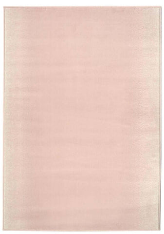 A soft blush pink maestro ombre pink rug with subtle texture and neatly finished edges perfect for cozy spaces
