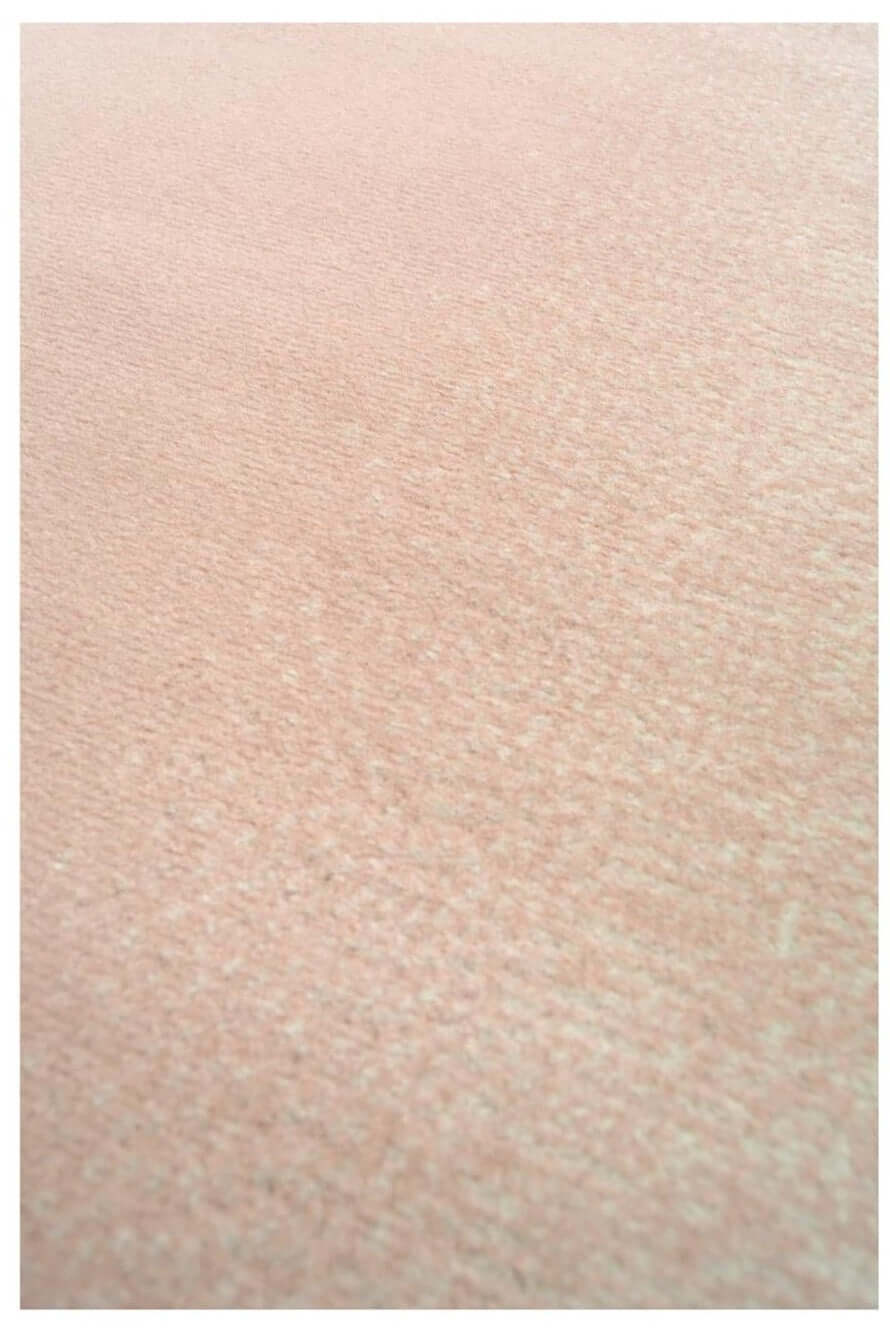 Soft blush pink textured fabric of maestro ombre pink rug with subtle uniform grain perfect for cozy decor
