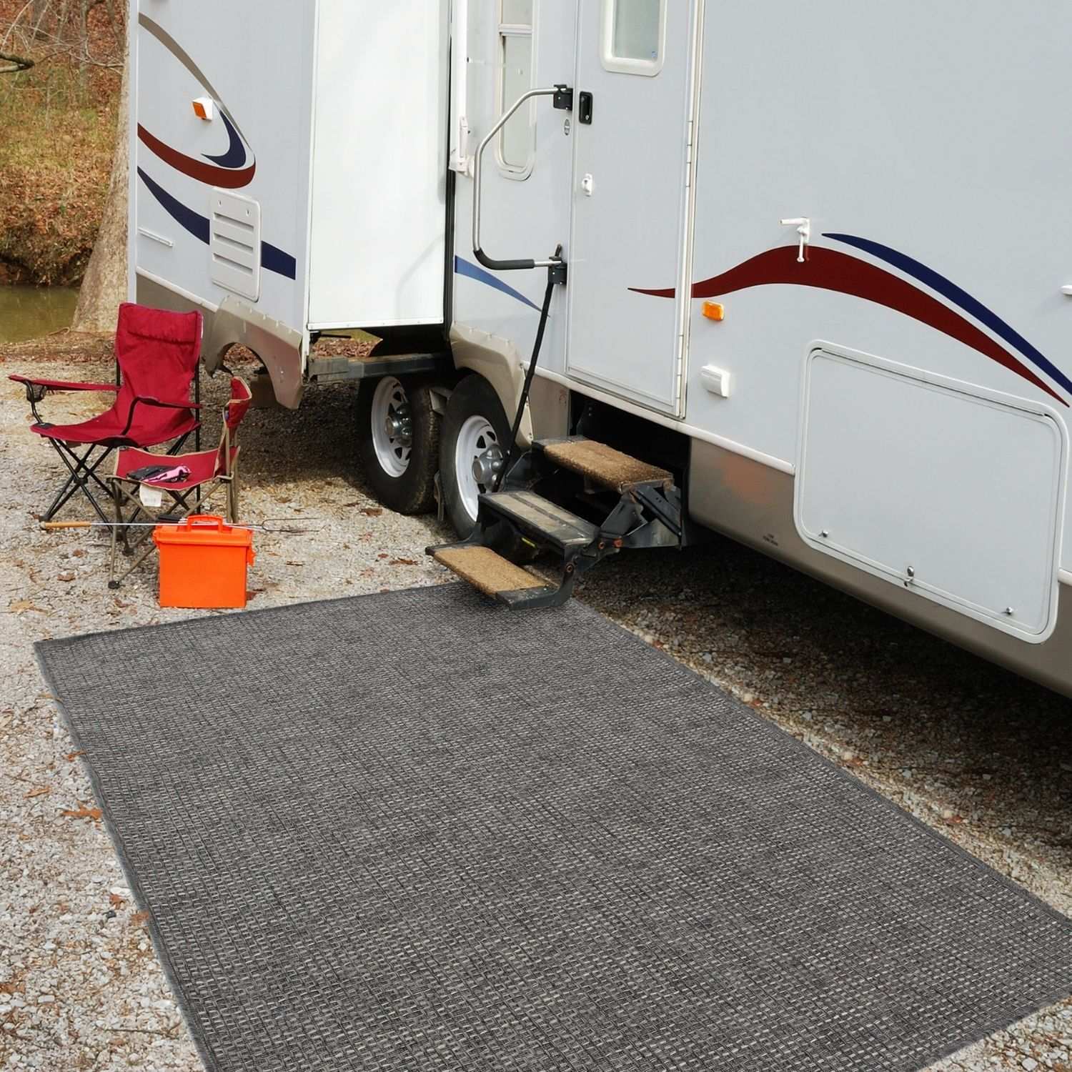 Gray textured magic outdoor rug dark grey placed in front of an rv as an outdoor rug mat