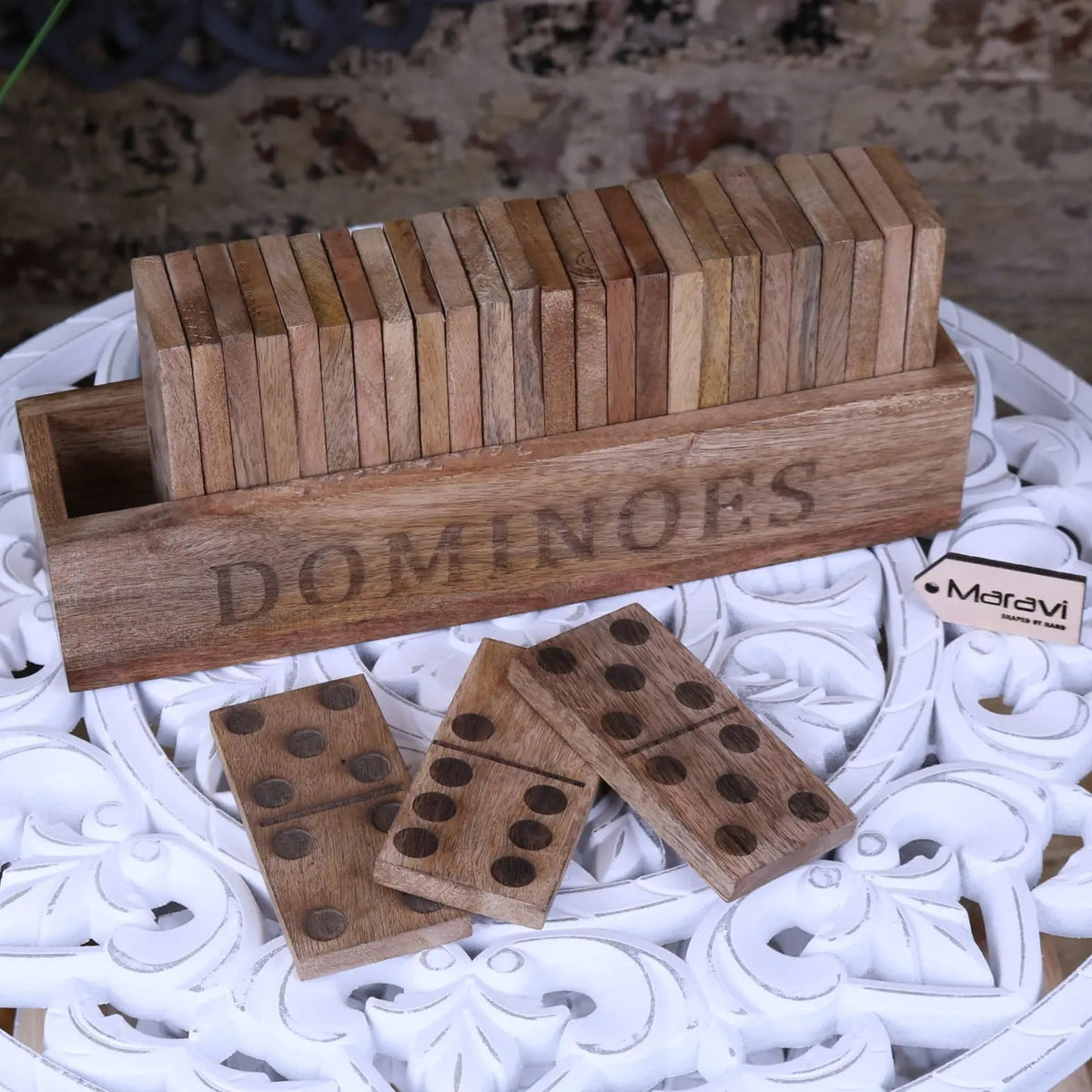 Mahua wooden domino set with holder featuring natural wood dominoes in a matching engraved wooden storage box branded maravi