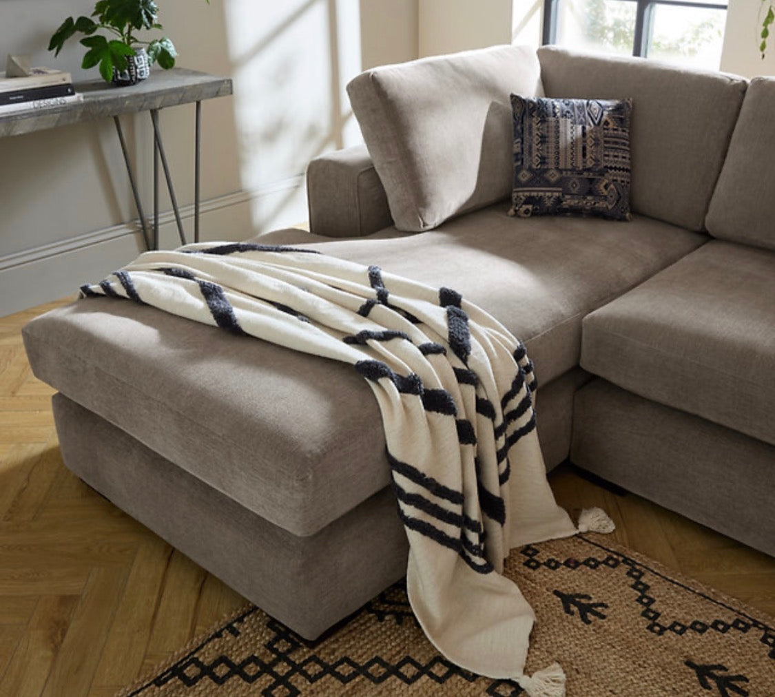 Beige maison corner sofa with matching ottoman and cream navy striped throw blanket offers custom corner sofa options