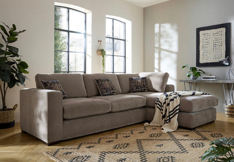 Beige maison corner sofa with plush cushions and patterned throw pillows featuring custom options for a corner sofa