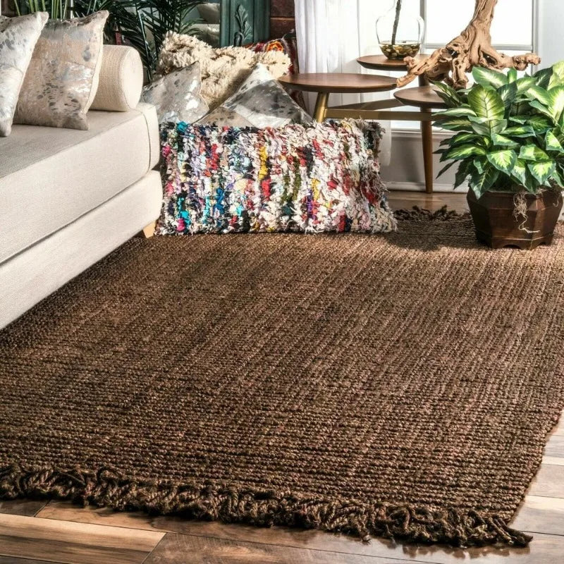 Brown woven jute makasi rug with fringed edges perfect for cozy natural home decor