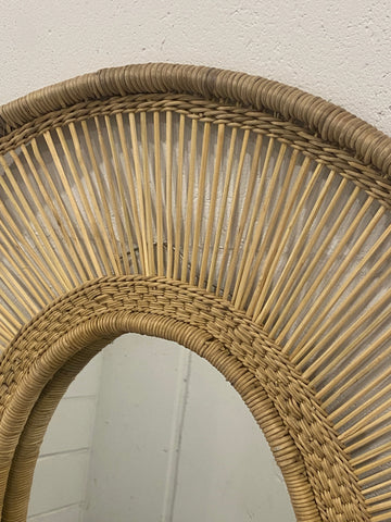 Natural woven rattan malawi mirror oblong with a curved fan-like frame in warm brown for stylish wall decor