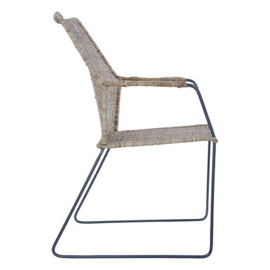 Manado angled design natural rattan chair with woven rattan seat and sleek black metal frame for stylish seating
