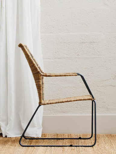 Manado angled design natural rattan chair with woven natural fiber seat and black metal frame in angled design natural style