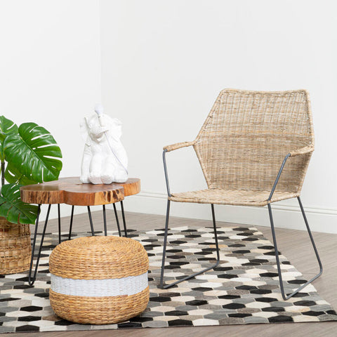 Manado angled design natural rattan chair with woven rattan seat and black metal frame perfect for cozy seating