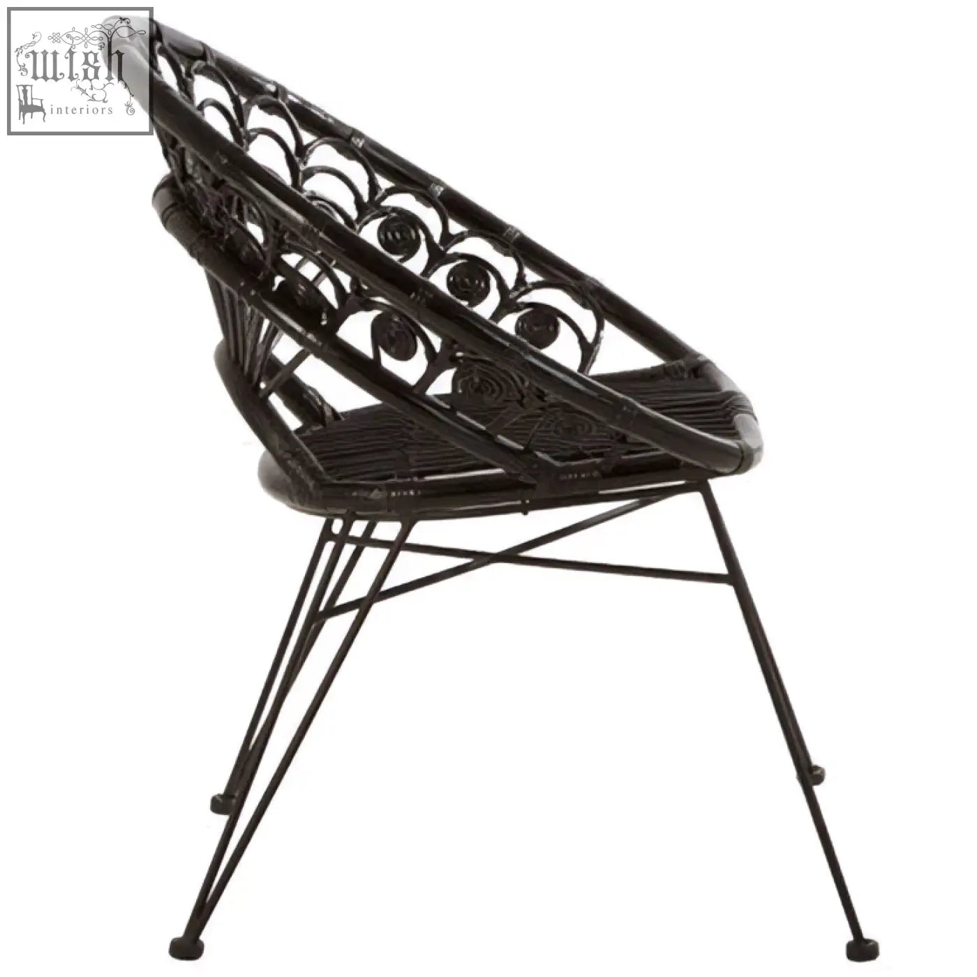 Black wrought iron manado black natural chair with intricate circular patterns and a woven natural rattan seat