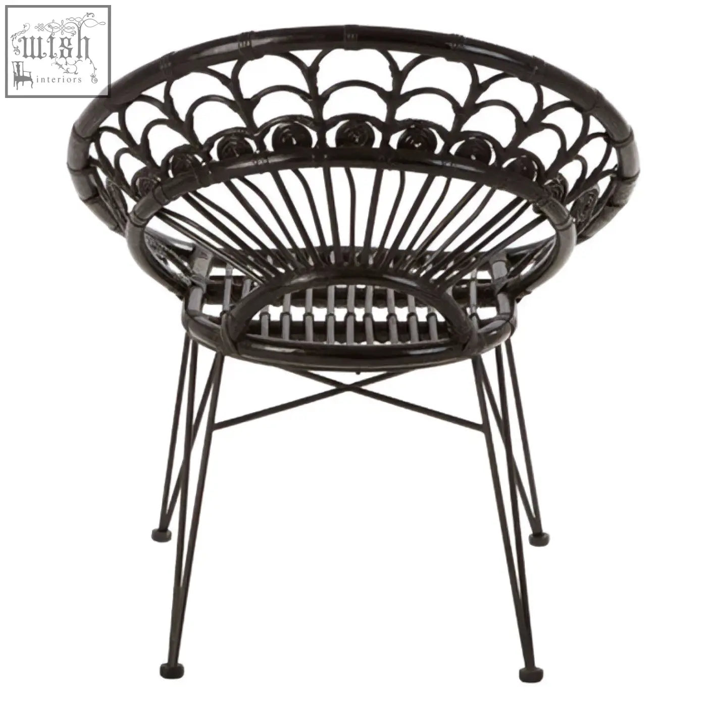 Black natural rattan manado chair with circular scalloped design and slender metal legs for stylish seating