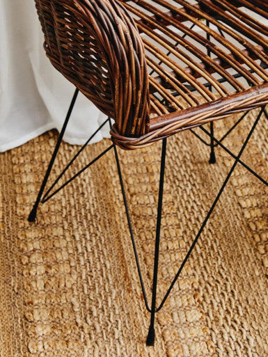 Manado natural croco rattan chair in woven brown natural croco rattan with slender black metal legs