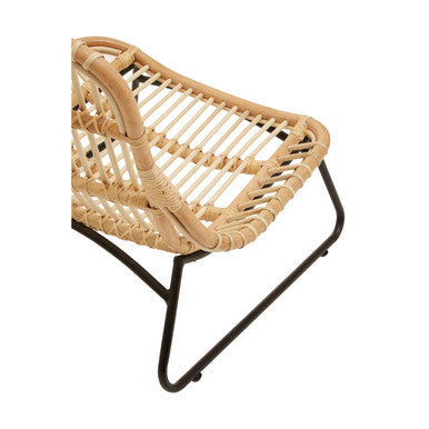 Manado relax natural rattan lounge chair with black metal legs featuring natural rattan for cozy seating