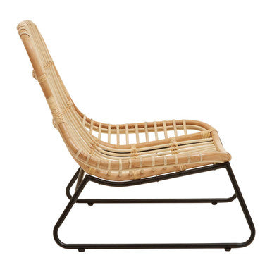 Manado relax natural rattan chair with sleek black metal frame in natural rattan perfect for lounging in style