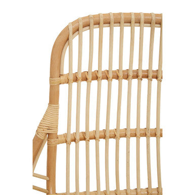 Natural rattan manado relax natural chair with curved backrest and vertical slats for cozy seating