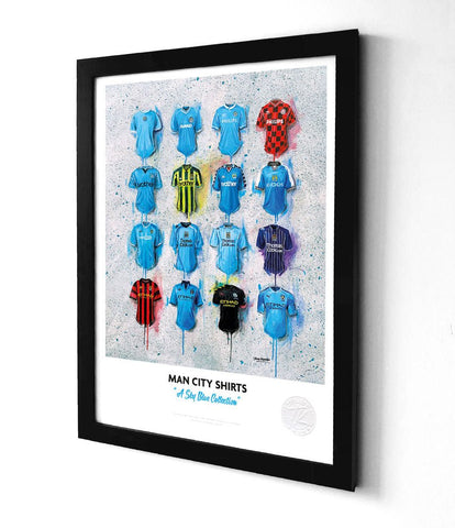 A manchester city framed print featuring an a3 collection of sky blues football jerseys in multiple vibrant colors