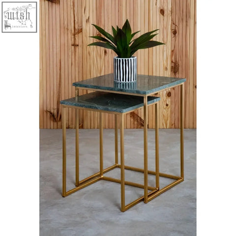 Set of two mandoli nest green marble side tables with dark green marble tops and interconnected gold metal frames