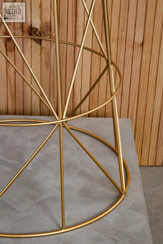 Gold-colored metal wireframe stand with geometric patterns for mandoli white marble round side table base
