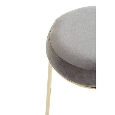 Gray velvet tall bar stool with slender gold-toned metal legs in manhattan grey velvet for stylish seating