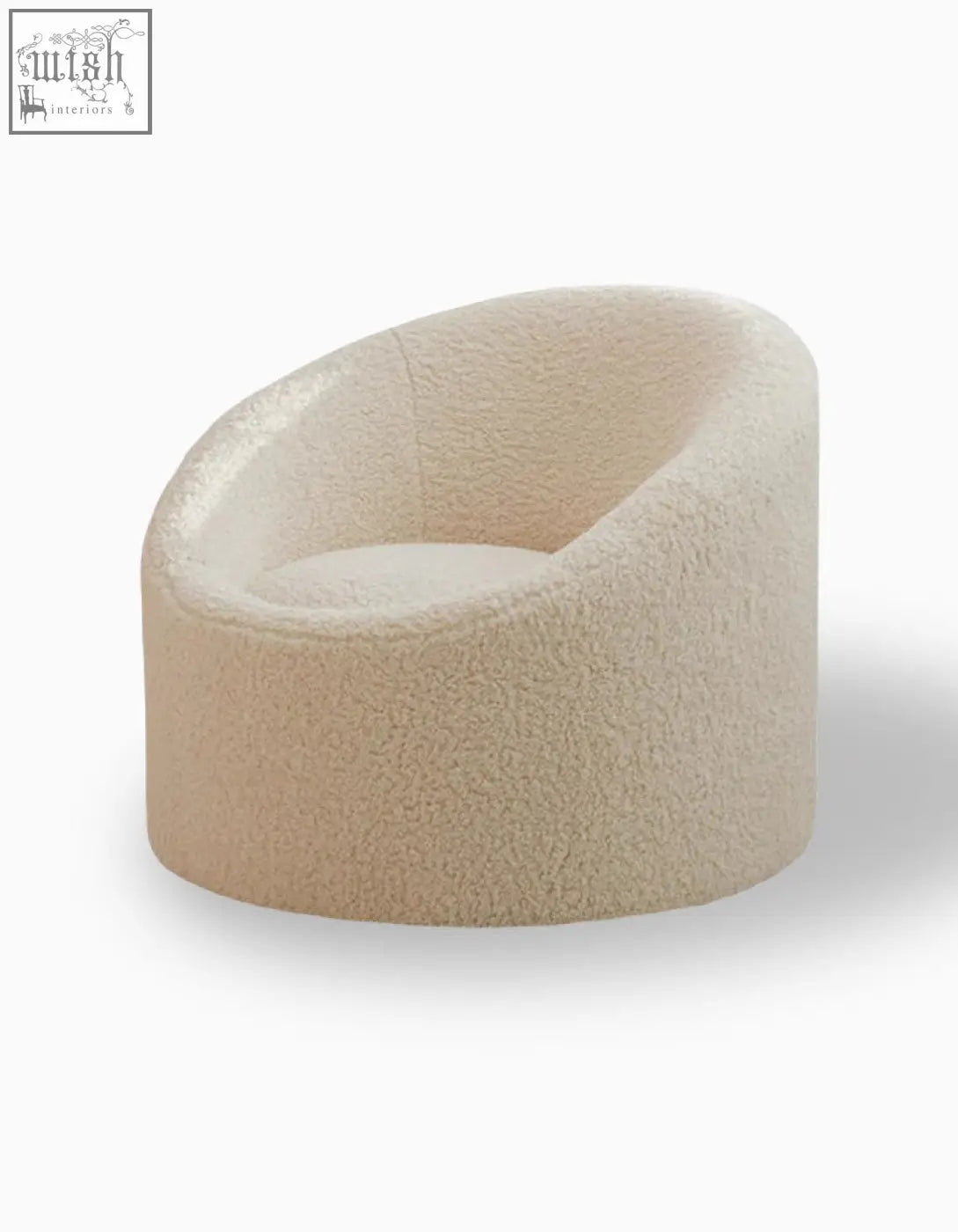 Cream-colored manon armchair with plush bouclé wool upholstery and rounded cozy design perfect for relaxing