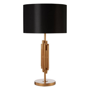 Black satin drum shade on a modern brass-finished manor table lamp with vertical cylindrical rods