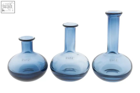 Set of three blue mouth blown glass vases with rounded bases from dutz collection manuela vase set featuring dulz logo