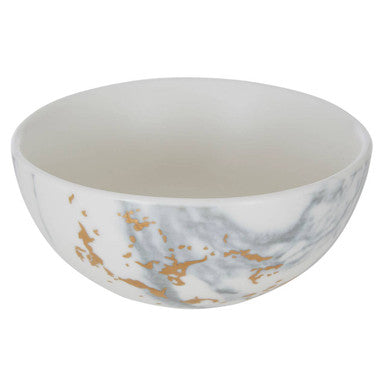 A white ceramic marble luxe snack bowl with gold flecks perfect for serving your favorite snacks