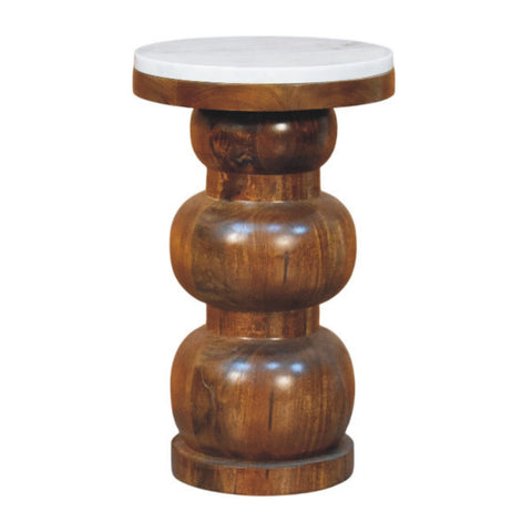 A sleek tiered wooden bulla side table with a smooth white marble top and rich brown mango wood base