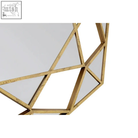 Marcia gold octagonal wall mirror with a gold-toned geometric faceted angular frame design for stylish decor
