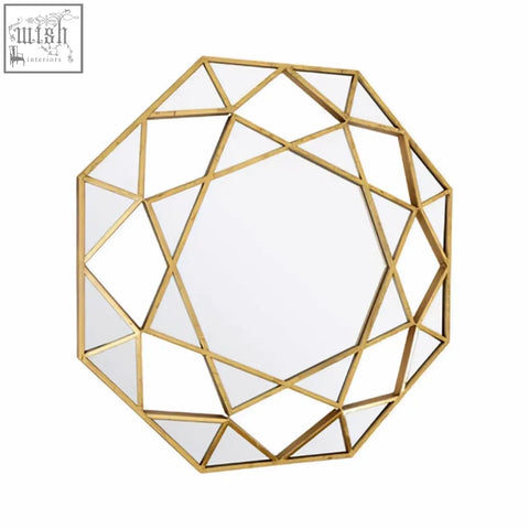 Marcia gold octagonal wall mirror with gold tone faceted geometric design perfect for stylish decor accents