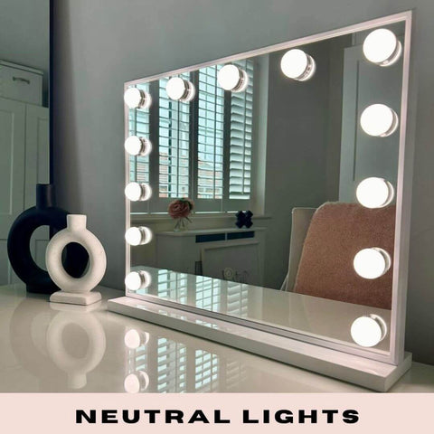White rectangular margot small hollywood mirror with evenly spaced circular bulbs perfect as a small hollywood mirror
