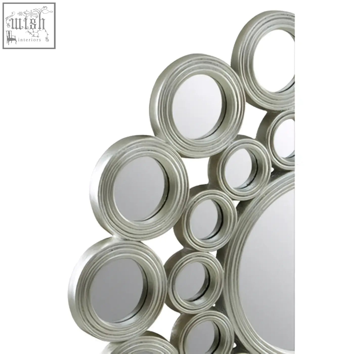 Maris silver wall mirror with a modern silver-toned circular design featuring layered concentric rings