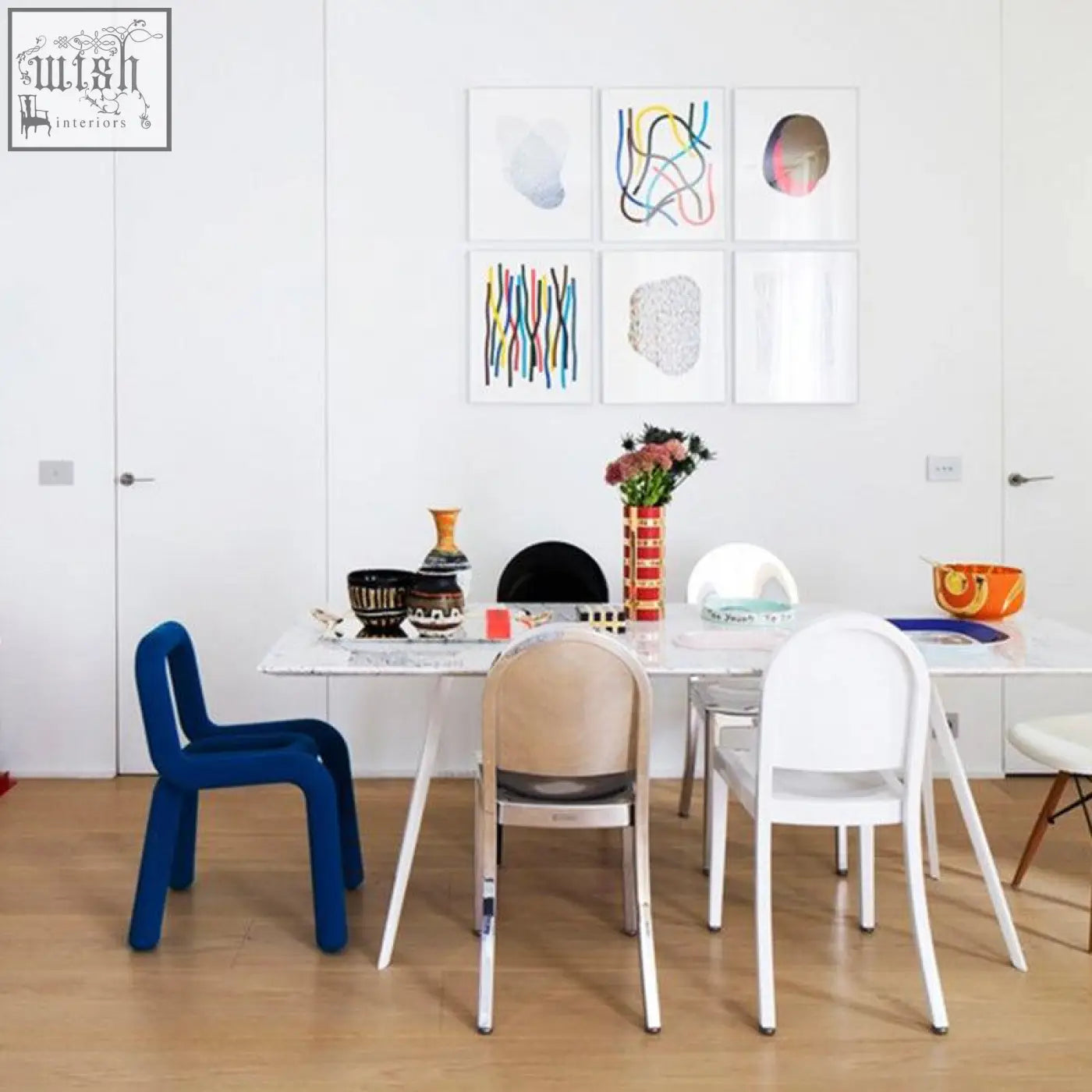 A vibrant blue plastic markel dining chair with a modern minimalist design perfect for dining areas