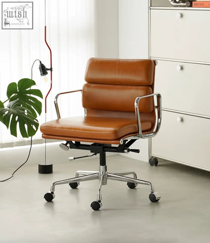 Brown leather office chair with chrome frame and five wheels in the marley office chair with swivel and height adjustable